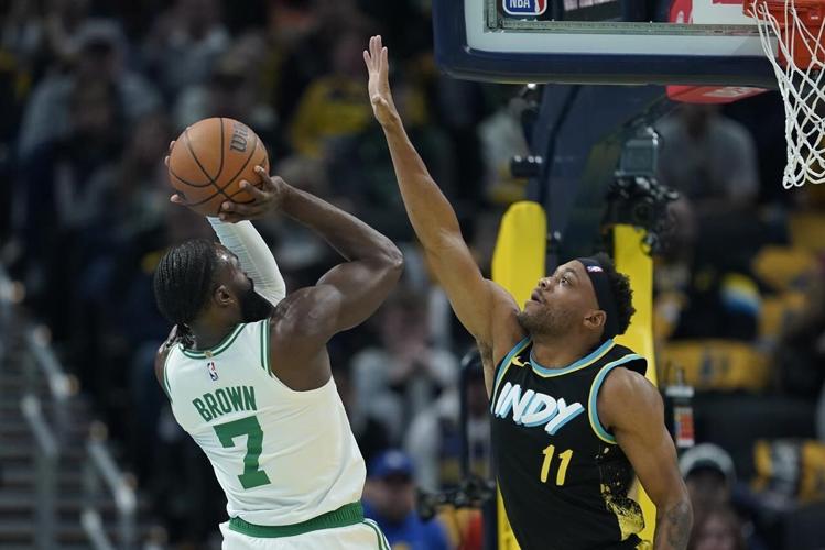 Haliburton's triple-double and late 4-point play help Pacers oust Celtics from NBA tourney