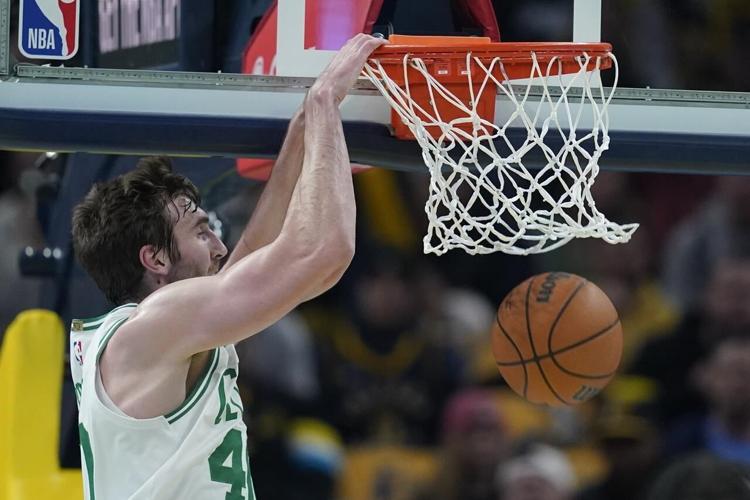Haliburton's triple-double and late 4-point play help Pacers oust Celtics from NBA tourney